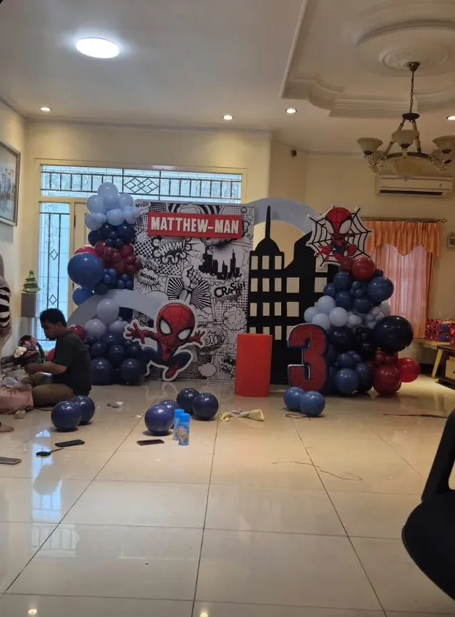 Spider-Man themed 3rd birthday balloon backdrop with custom comic-book signage