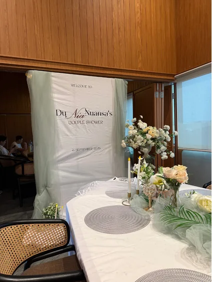 Bridal shower backdrop and table styling