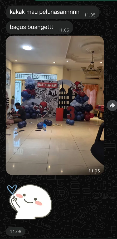 Screenshot of the original WhatsApp message from the Birthday Balloon Client, with a photo of the Spider-Man balloon backdrop